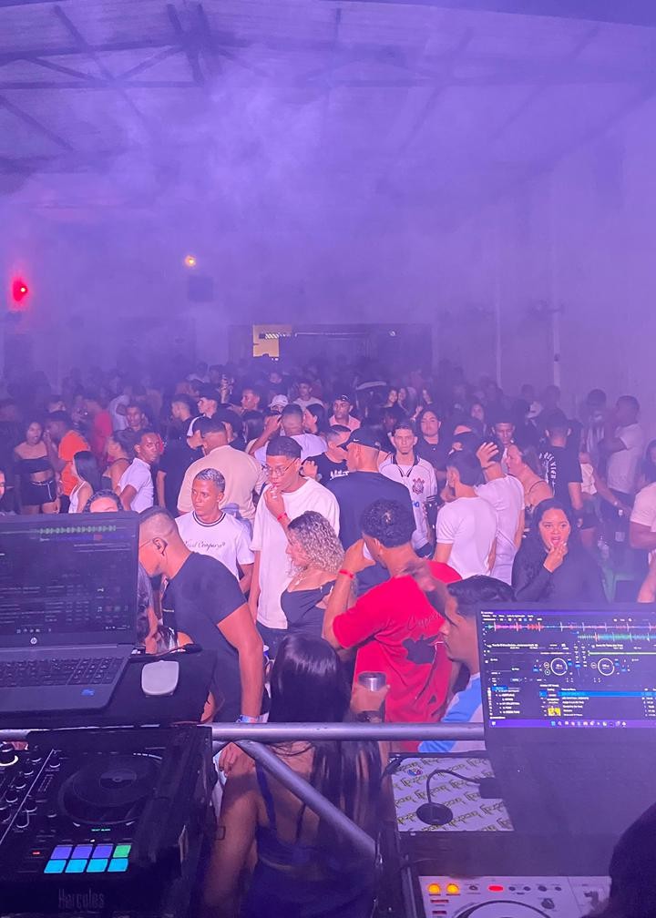 Nightclub with neon lights and crowd